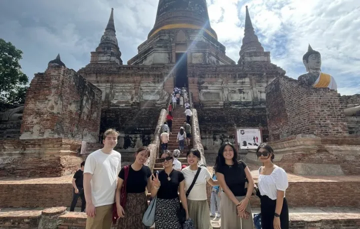 Cady with friends in front of a temple
