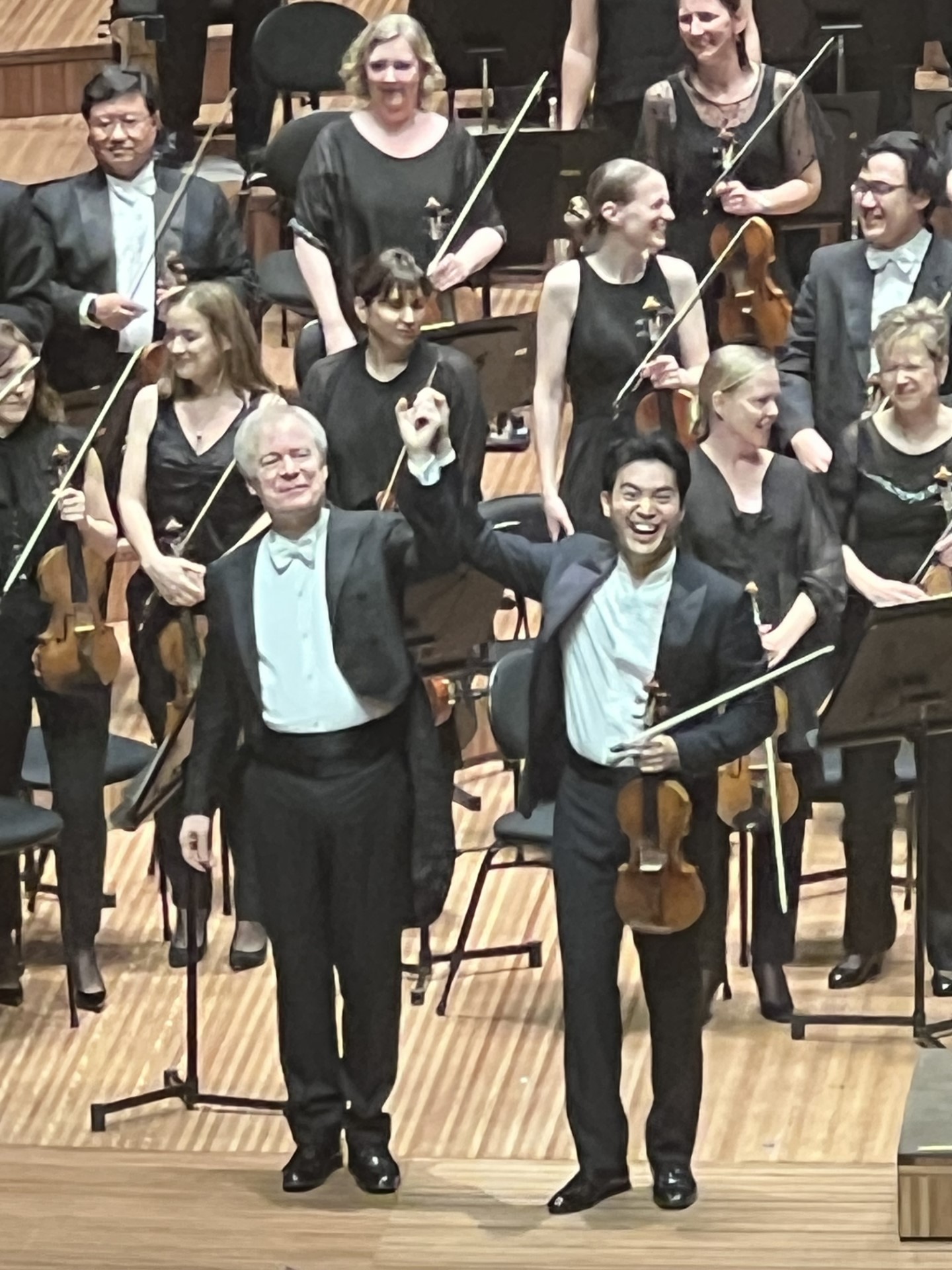 Famous violinist Ray Chen bowing after his performance in the Sydney Opera House