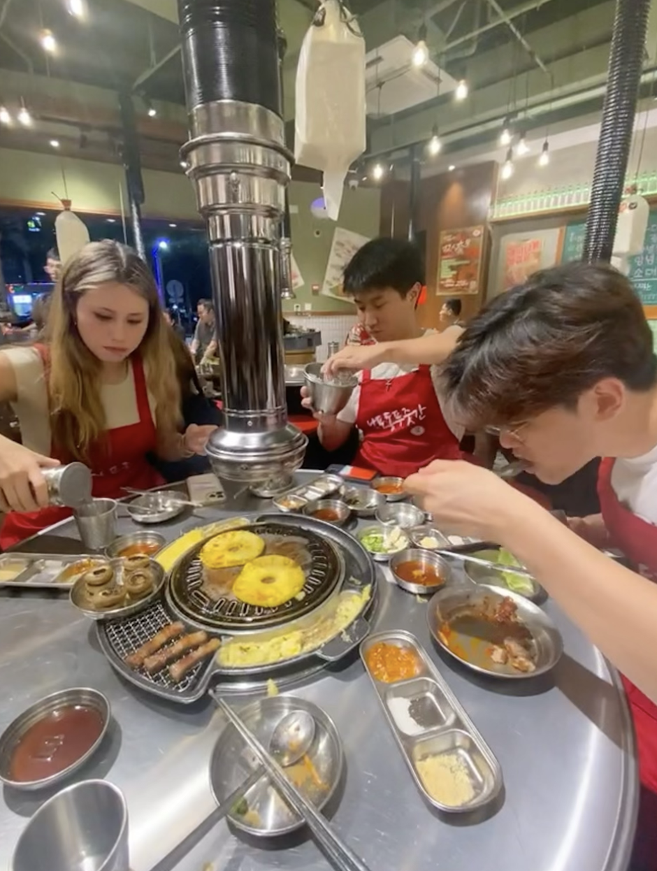 Julia and other GRIP interns enjoying food