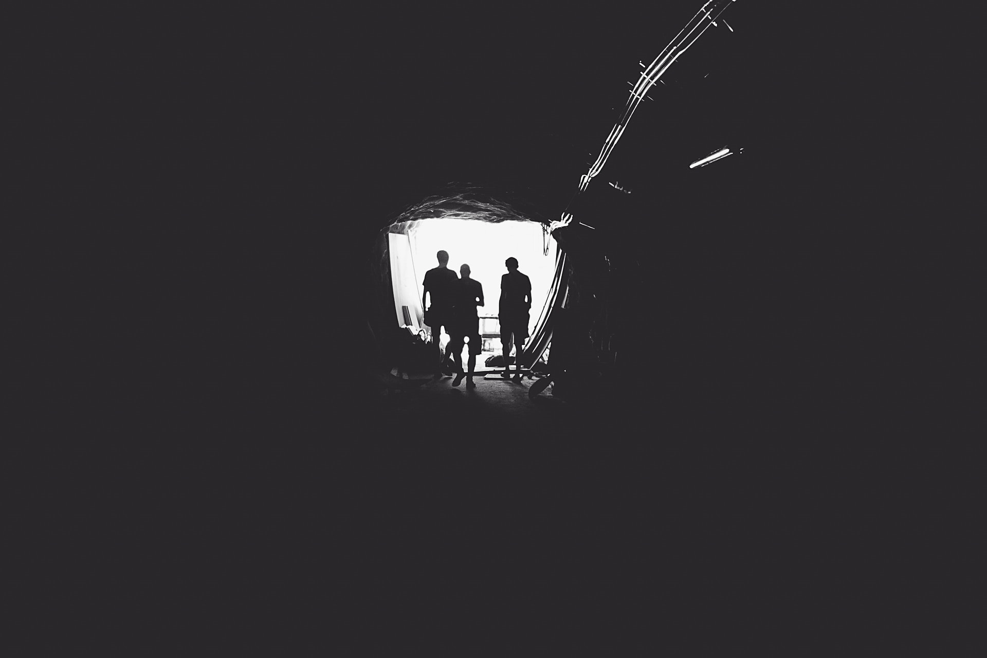 Men in tunnel