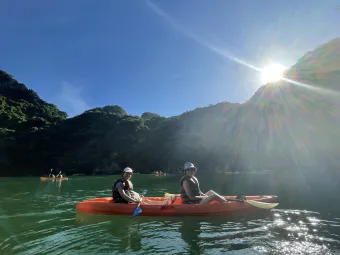 Zoe and friend kayaking in Halong Bay