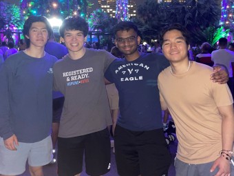 Kai with friends at a light show in the Gardens by the Bay.