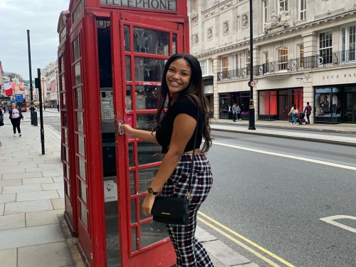 Lah'Nasia by a red phonebook in London