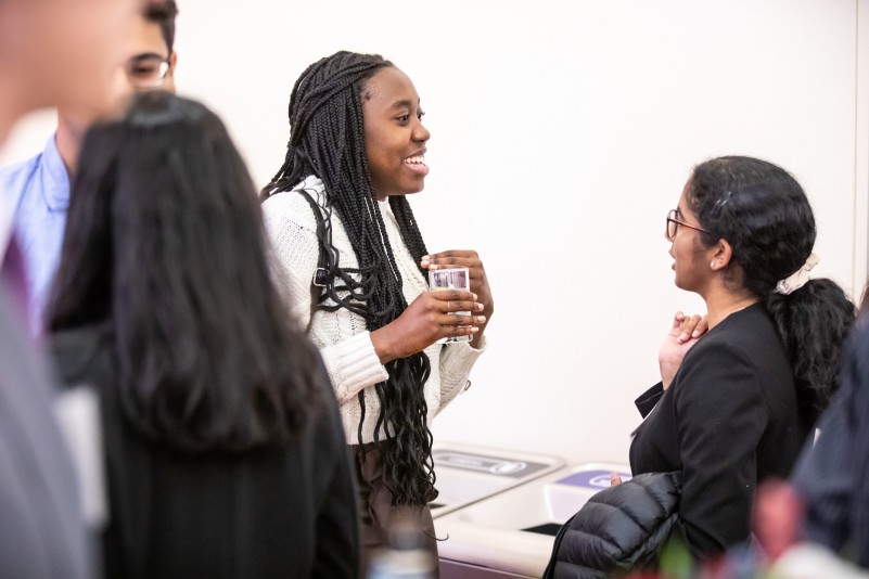 Students in conversation at a Perry World House event