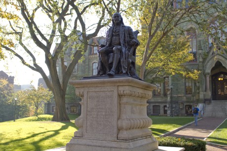 Benjamin Franklin statue with College Hall in the background