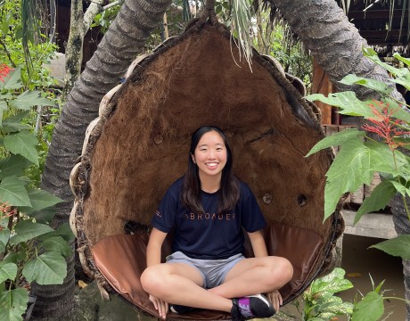 Rebecca Peng sitting in coconut themed chair