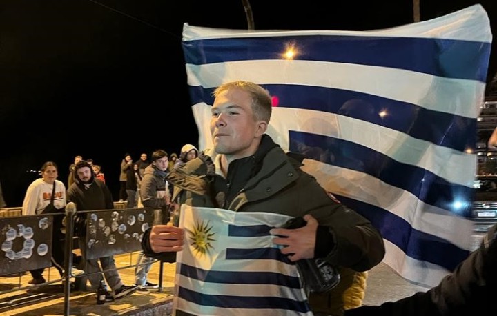 Silas with the Uruguay flag