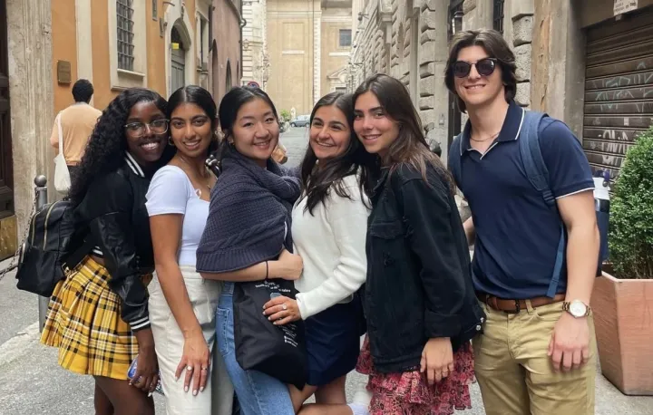 Dasmine and friends walking through the streets of Rome