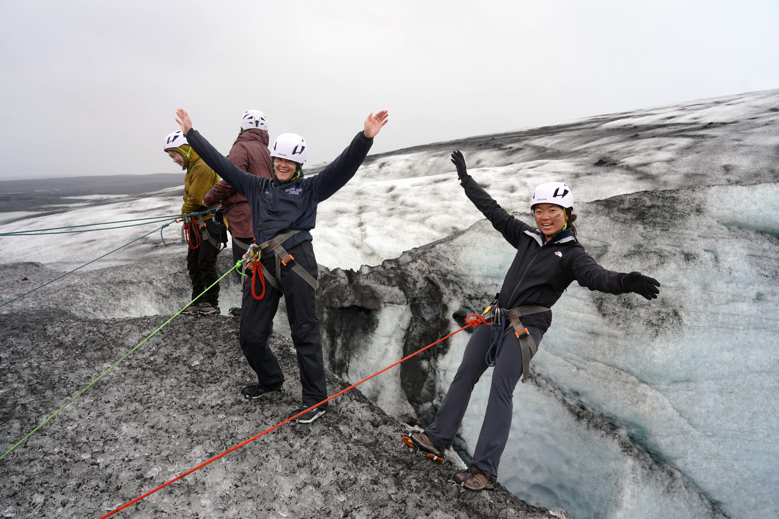 Students hiking on cliff